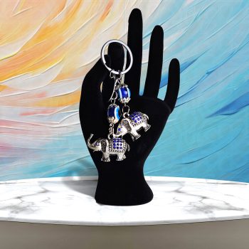 Sleek Blue Eye Keychain with 2 Elephants